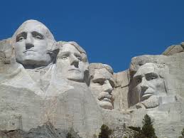 Carving of President di Grazia scheduled on Mount Rushmore.